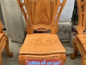 Bàn ăn bầu dục gỗ gõ đỏ 8 ghế hoa lá tây Chị Lam (Sơn La) 8 Ghế ăn gỗ Gõ