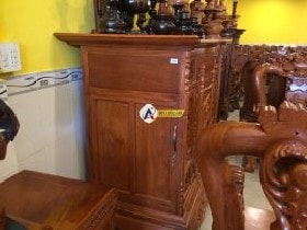 Tủ thờ hoa sen gỗ gõ đỏ cao cấp 12 cánh của tủ thờ ở 2 bên hồi tủ