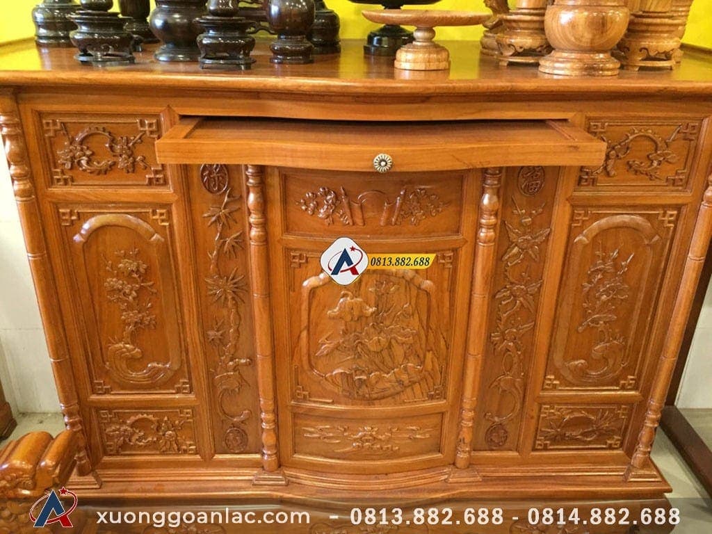 Tủ thờ hoa sen gỗ gõ đỏ cao cấp 19 Mặt ngăn kéo của từ thờ giúp tăng thêm diện tích để đồ thờ