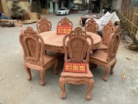 Bộ bàn ăn tròn 8 ghế hồng hạt gỗ hương đá đục 2 mặt (Anh Tuấn, Đà Nẵng) 7 Bàn ăn tròn nguyên khối 1m60, mặt bàn trơn gỗ hương đá vân nổi siêu đẹp. Nhiều khách hàng lựa chọn đặt thêm tấm kính trên mặt để tạo thành bàn ăn xoay tiện lợi, gắn kết gia đình