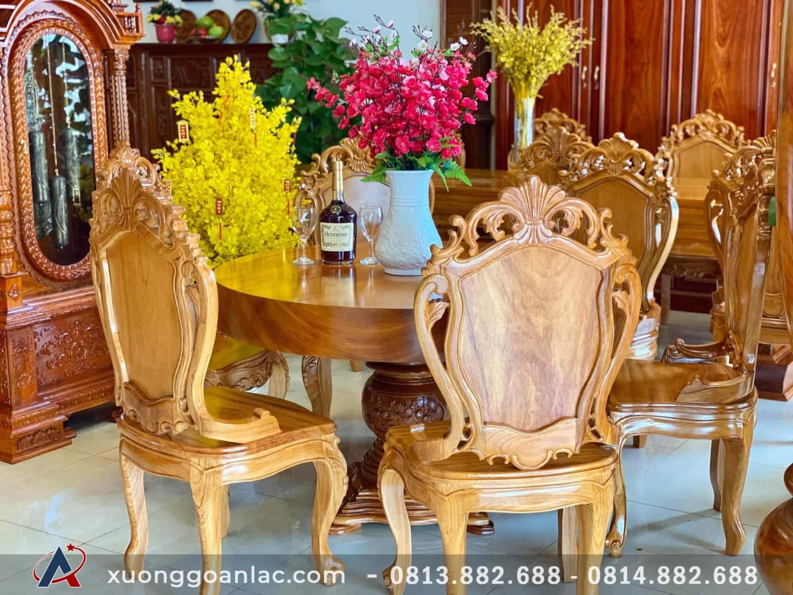Bộ bàn ăn tròn nguyên khối 6 ghế gỗ gõ đục hoa lá tây sang trọng 4 bộ bàn ăn tròn nguyên khối 6 ghế