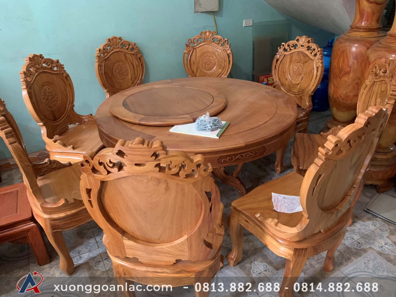 Bộ bàn ăn tròn 8 ghế louis gỗ gõ đỏ 2 tầng (mâm xoay) 15 Bàn ăn thiết kế dạng bàn tròn được sử dụng nhiều trong các gia đình đông thành viên.