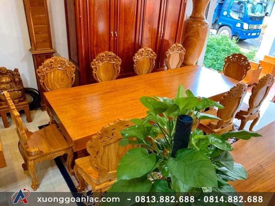 Bộ bàn ăn nguyên khối gỗ gõ đỏ 10 ghế đục hoa lá tây (Chú Giang, Ninh Bình) 10 Bộ bàn ăn nguyên khối gỗ gõ đỏ 10 ghế đục hoa lá tây