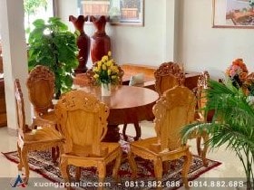 Bộ bàn ăn tròn nguyên khối gỗ gõ đỏ 7 ghế đục hoa lá tây (Anh Sơn, Hà Nội) 8 Chất liệu 100% gỗ gõ đỏ rất nặng và chắc, đặc biệt không phải lo mối mọt