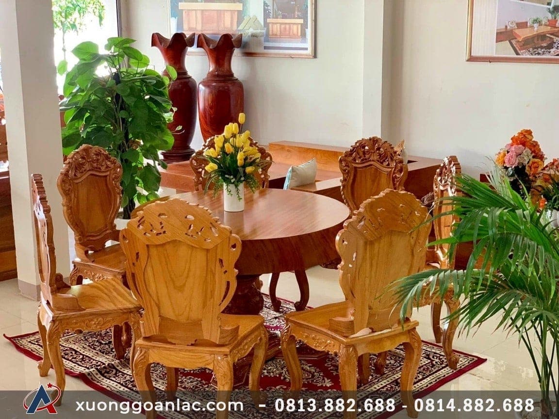 Bộ bàn ăn tròn nguyên khối gỗ gõ đỏ 7 ghế đục hoa lá tây (Anh Sơn, Hà Nội) 11 bàn ăn gỗ gõ đỏ