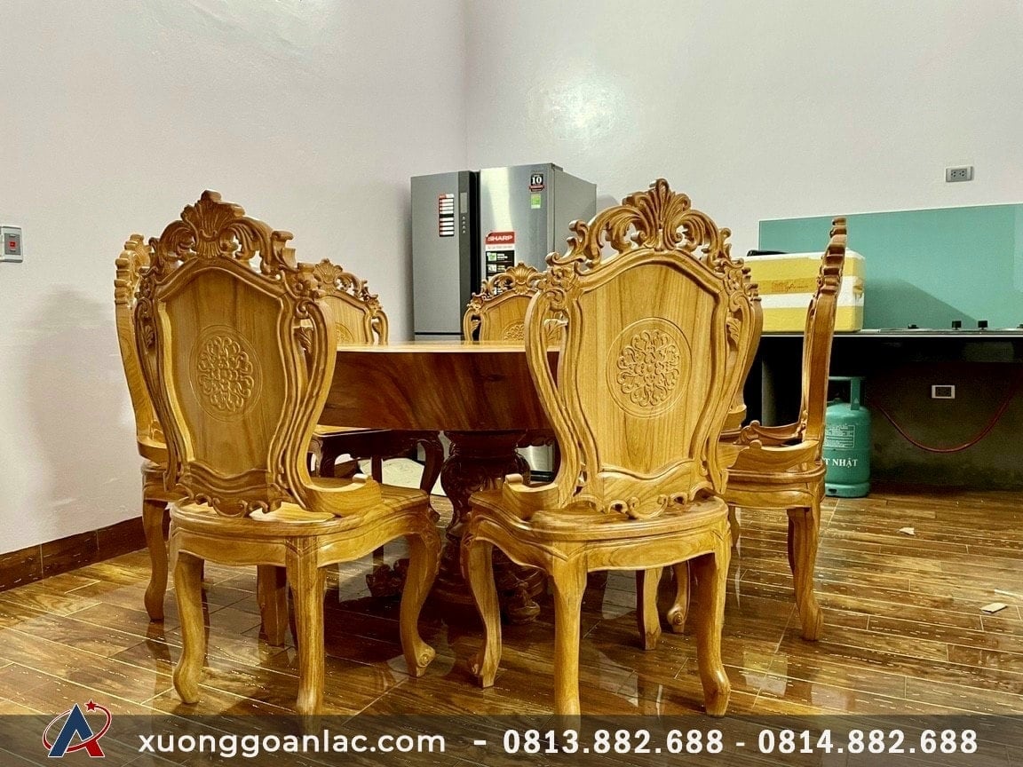 Bộ bàn ăn tròn nguyên khối 8 ghế gỗ gõ đỏ đục hoa lá tây (Chị Thủy, Vinhomes Times City) 7 Bàn ăn đặc nguyên khối đường kính 140cm dày 17cm