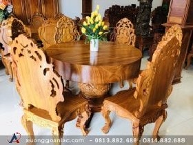 Bộ bàn ăn tròn nguyên khối gỗ gõ đỏ 6 ghế hoàng gia (Chị Uyên, Bắc Ninh) 12 Chân trụ bàn à một khối trụ tròn được điêu khắc dạng lục bình hút sinh khí