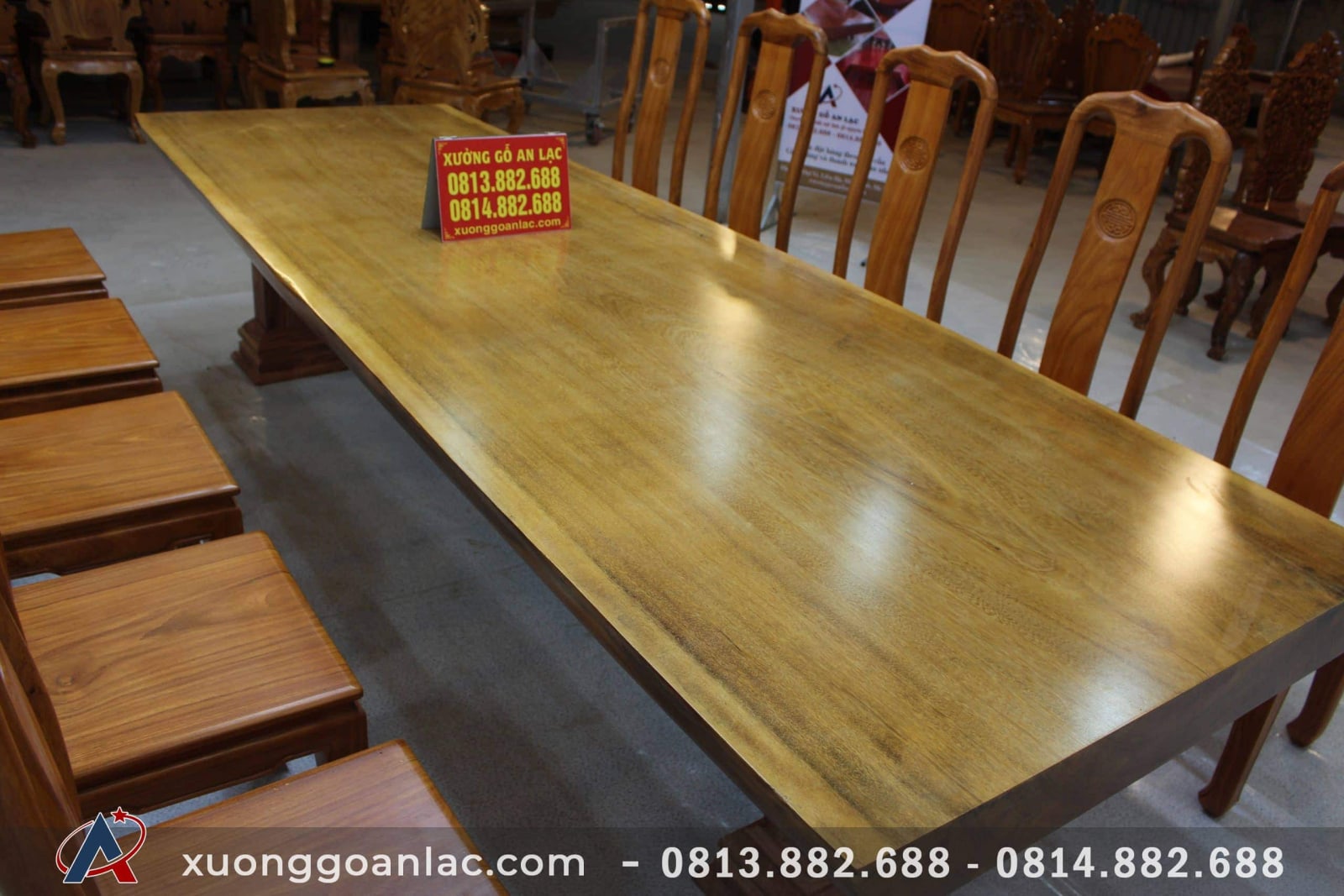 Bộ bàn ăn nguyên khối dài 3m03 với 10 ghế thọ gõ gõ đỏ cao cấp 7 bàn ăn nguyên khối vip