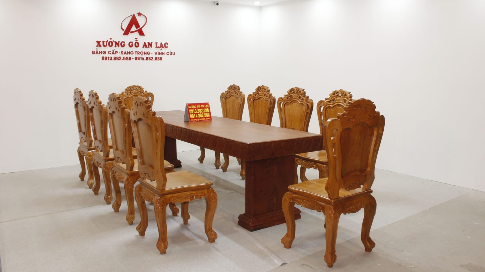 Bộ bàn ăn nguyên khối 10 ghế hoa lá tây gỗ hương đá cao cấp 34 Bộ bàn ăn gỗ hương đá 10 ghế hoàng gia vip tựa cong