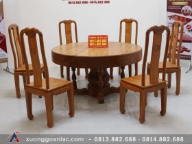 Bộ bàn ăn tròn nguyên khối gỗ gõ đỏ kết hợp 6 ghế triện chữ thọ thủ công