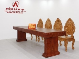 Bộ bàn nguyên khối 8 ghế hoàng gia vip đục tựa cong gỗ hương đá siêu vân cực đỉnh 17 bộ bàn hương đá vip 275cm