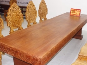 Bộ bàn nguyên khối 8 ghế hoàng gia vip đục tựa cong gỗ hương đá siêu vân cực đỉnh 11 bàn ăn nguyên khối đục sen dẹo