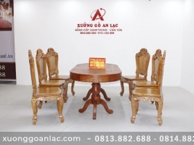 Bàn ăn gỗ hương đá bầu dục khuôn tranh