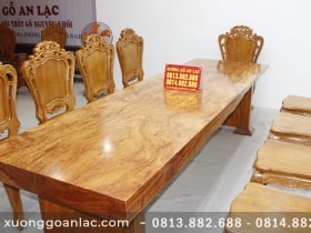 Bàn nguyên khối gỗ nu gõ 3m05 với 10 ghế hoa lá tây đục tay cực vip 13 bộ bàn ăn 10 ghế