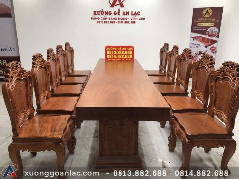 Nội thất gỗ tự nhiên có đắt hay không? 2 Bo ban an nguyen khoi go huong da vs 10 ghe hoa la tay 4 scaled e1663647690422