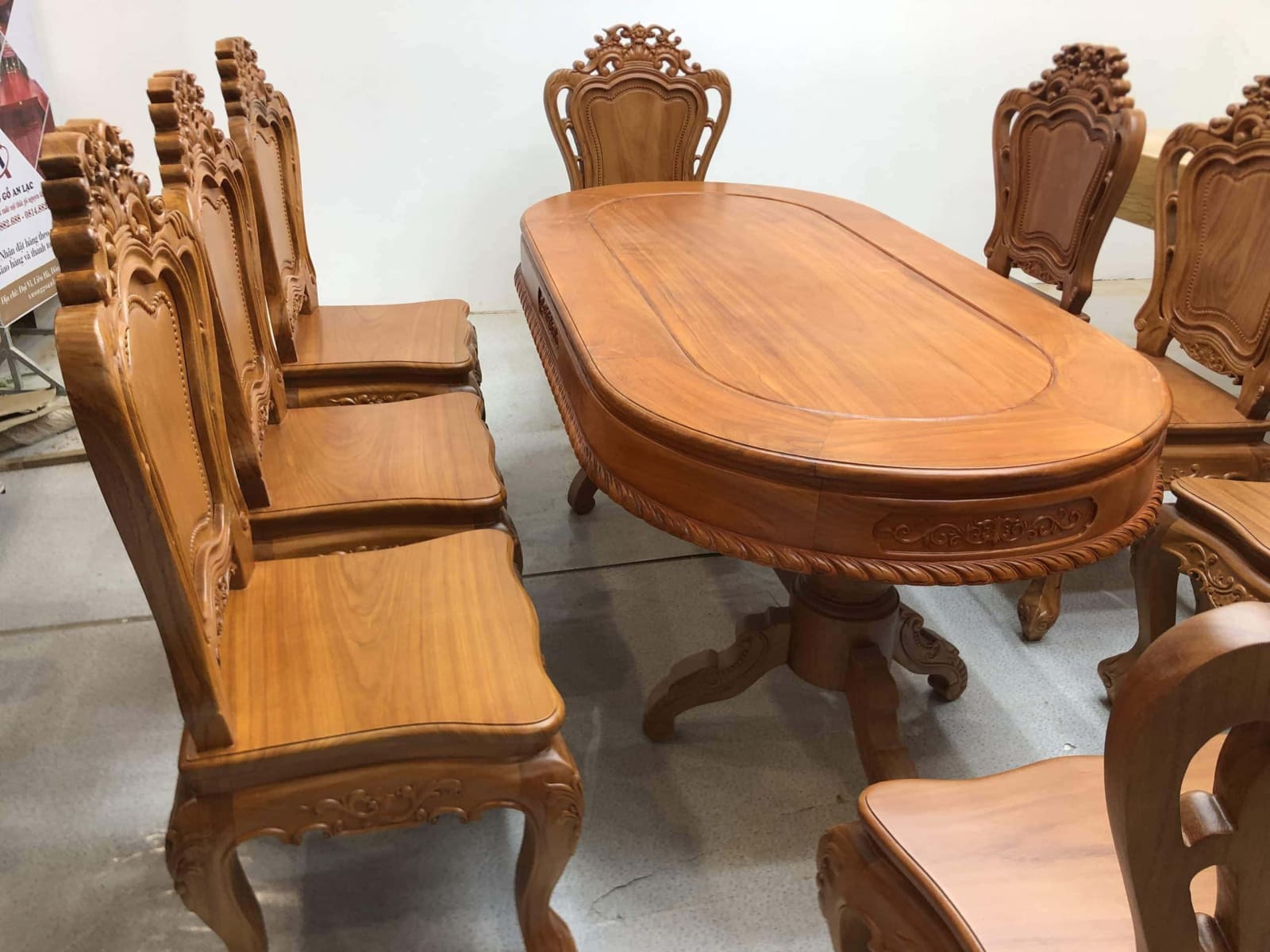 Bộ bàn ăn oval 8 ghế gỗ gõ đỏ cao cấp (Anh Liêm, Bắc Giang) 6 bàn ghế gỗ gõ đỏ