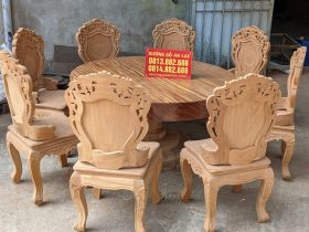 bàn ăn tròn gỗ nguyên khối