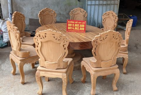 bàn ăn tròn gỗ nguyên khối