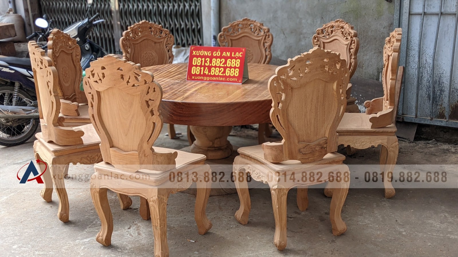 Bộ bàn ăn tròn nguyên khối gỗ gõ đỏ 8 ghế hàng siêu vân (Anh Phi, Thanh Hóa) 14 Bộ bàn ăn tròn nguyên khối gỗ gõ đỏ 8 ghế hàng siêu vân