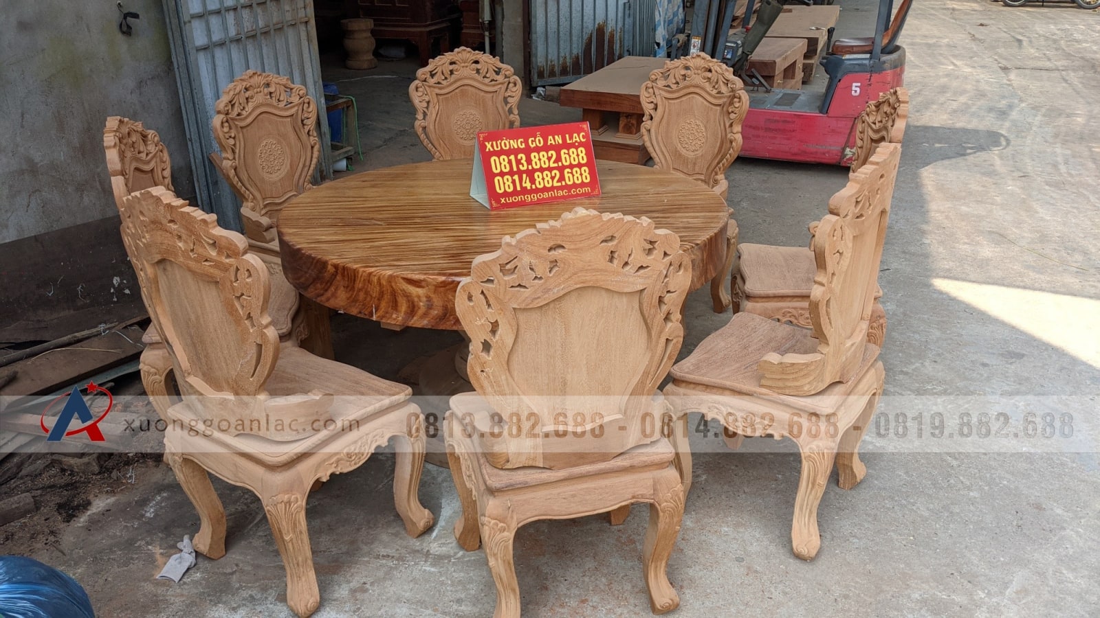 Bộ bàn ăn tròn nguyên khối gỗ gõ đỏ 8 ghế hàng siêu vân (Anh Phi, Thanh Hóa) 15 bàn ăn tròn gỗ gõ đỏ nguyên khối