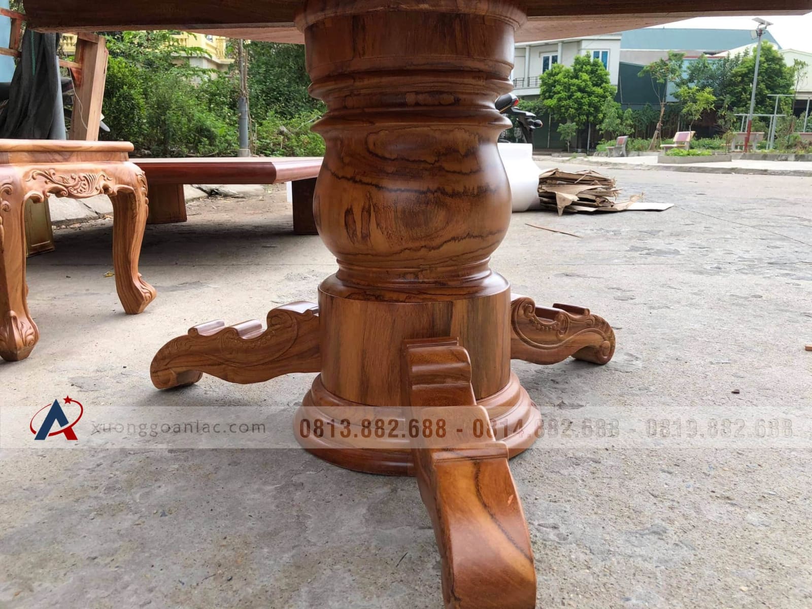 Bộ bàn ăn gỗ gõ đỏ nguyên khối hàng tuyển gỗ lựa vân (Anh Huân, Thanh Hóa) 14 bàn ăn gỗ nguyên khối chân trụ tròn
