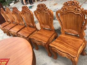 Bộ bàn ăn gỗ gõ đỏ nguyên khối hàng tuyển gỗ lựa vân (Anh Huân, Thanh Hóa) 10 ghế ăn mẫu louis hoa lá tây