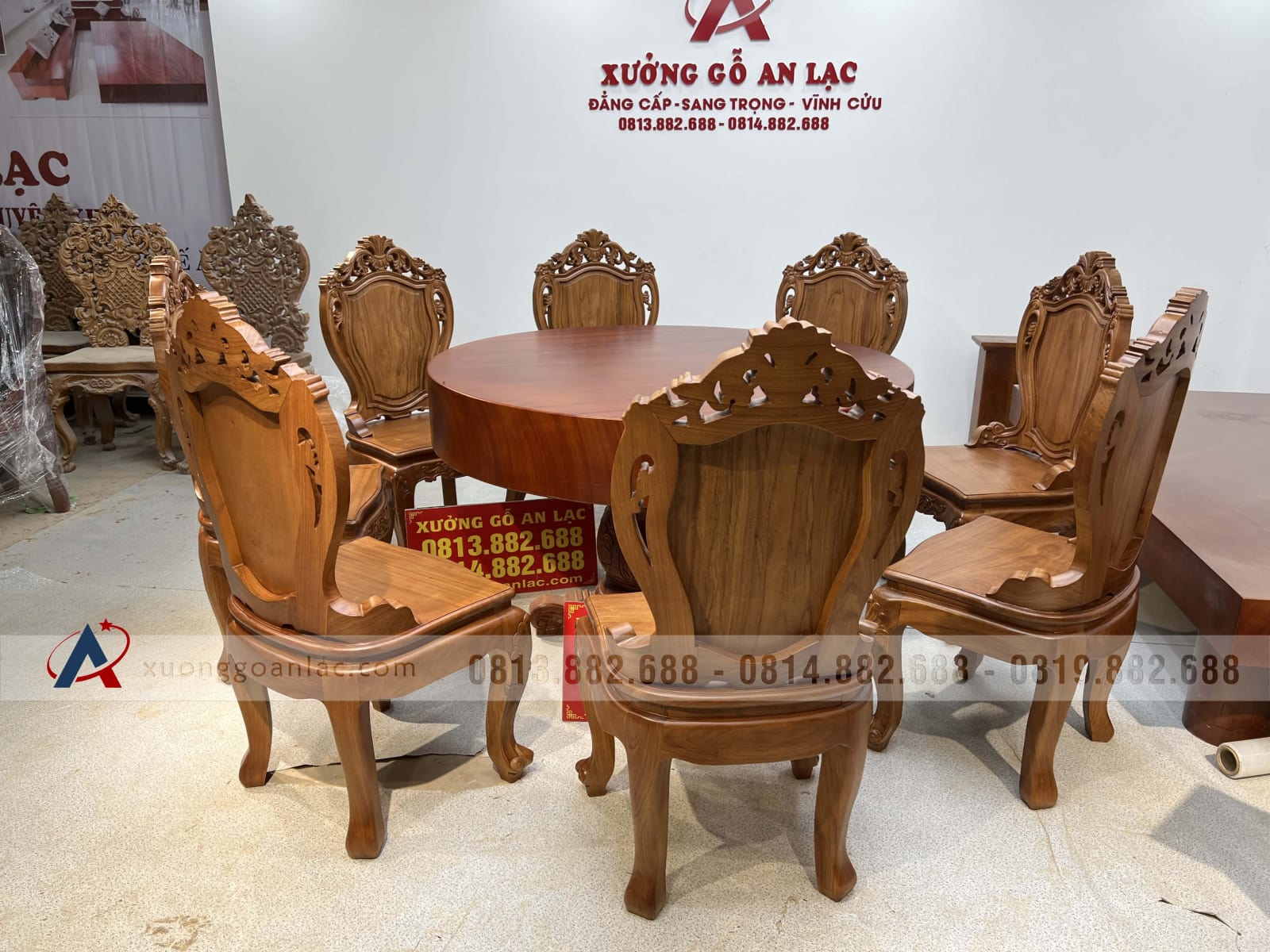 Bộ bàn ăn tròn gõ đỏ nguyên khối 8 ghế louis có tay (Chú Hùng, Hải Dương) 25 bàn ăn nguyên khối gỗ gõ đỏ 8 ghế