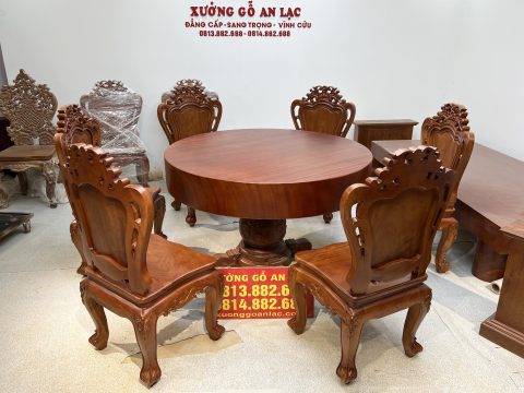 bàn ăn tròn gõ đỏ nguyên khối
