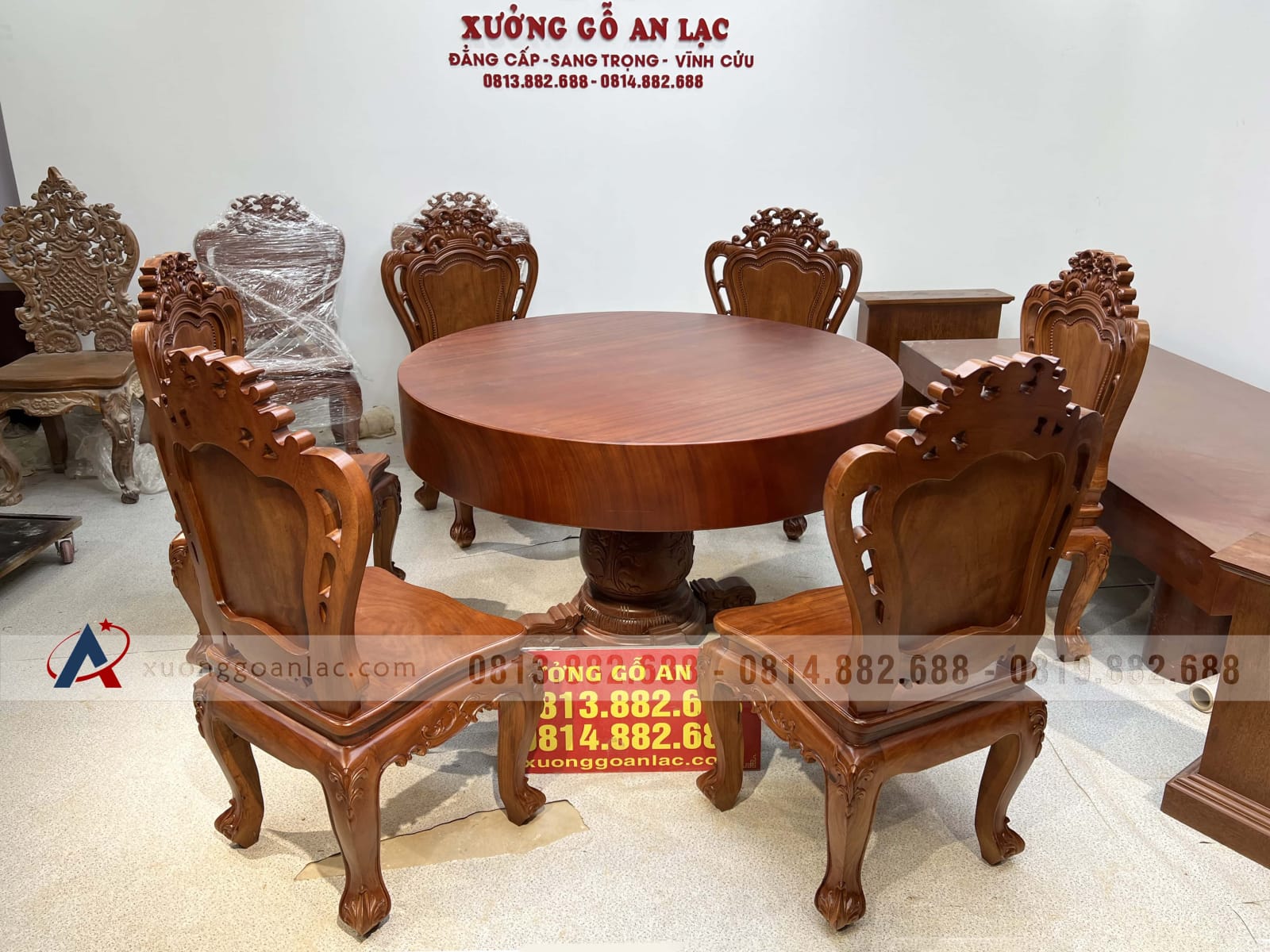 Bộ bàn ăn tròn nguyên khối 6 ghế hoa lá tây gỗ gõ đỏ (Anh Lợi, Hồ Chí Minh) 28 bàn ăn tròn gõ đỏ nguyên khối