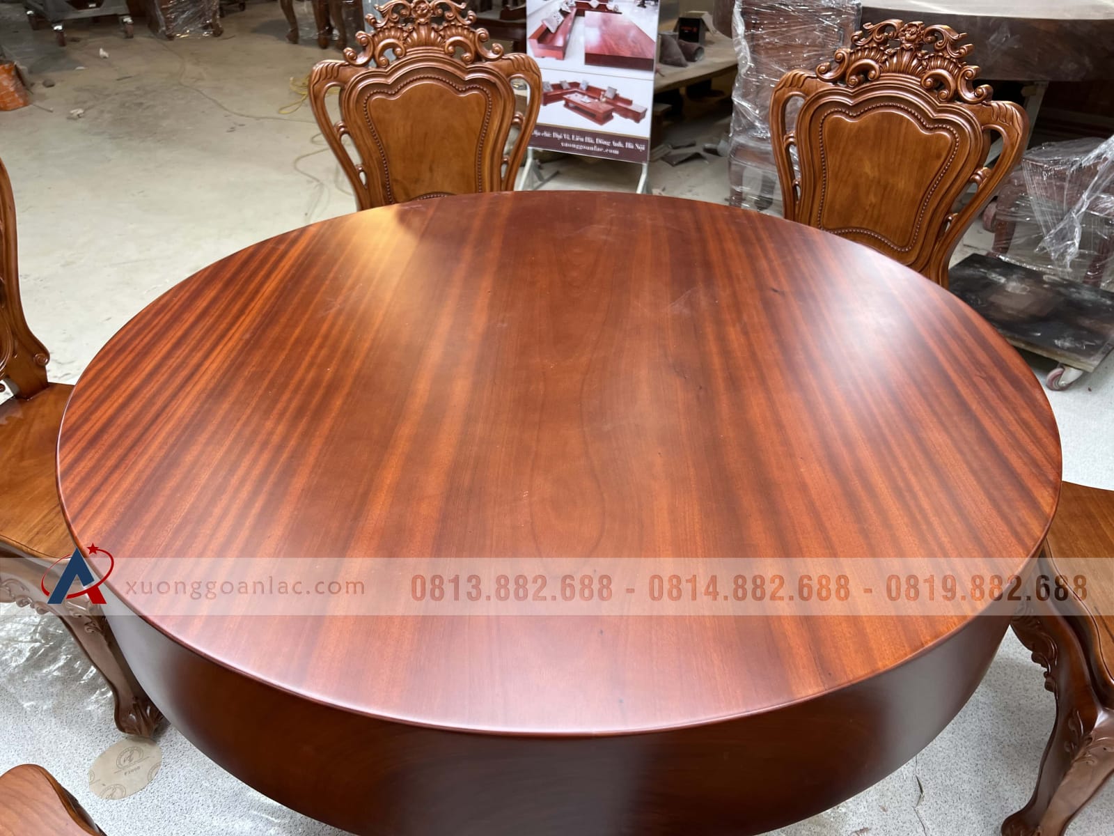 Bộ bàn ăn tròn nguyên khối 6 ghế hoa lá tây gỗ gõ đỏ (Anh Lợi, Hồ Chí Minh) 30 bàn ăn gỗ gõ đỏ nguyên khối