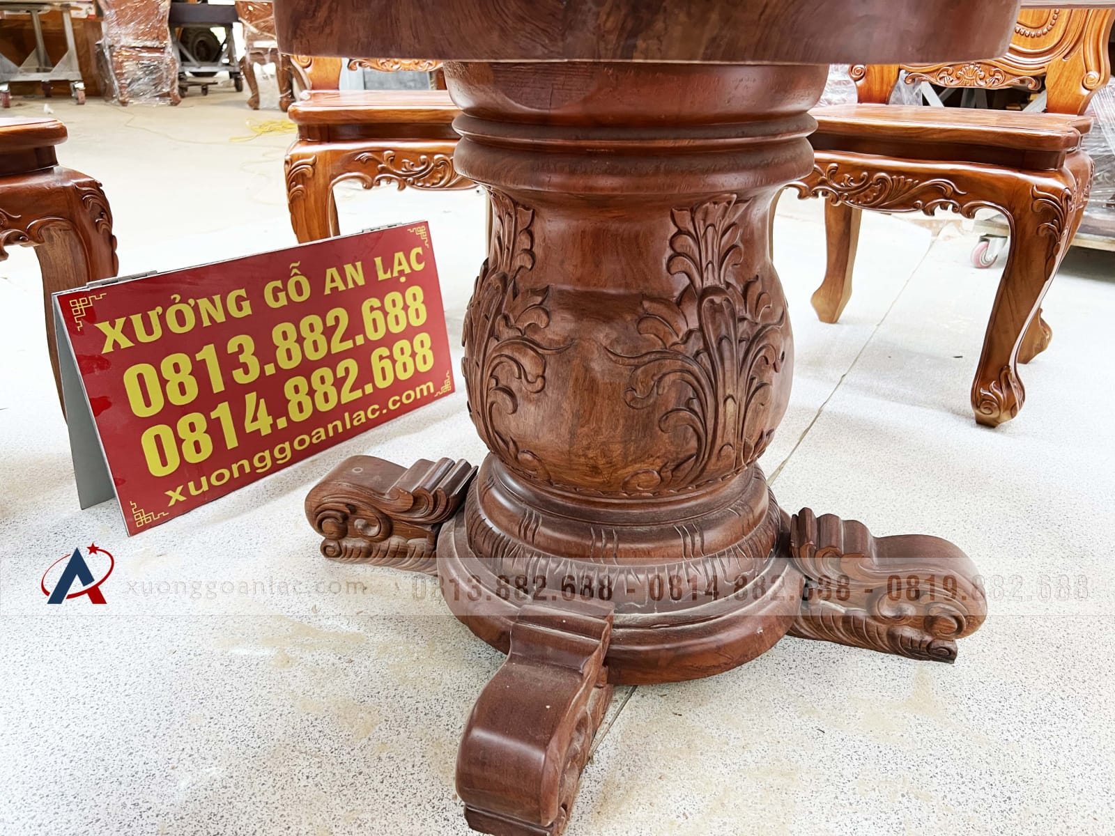 Bộ bàn ăn tròn nguyên khối 6 ghế hoa lá tây gỗ gõ đỏ (Anh Lợi, Hồ Chí Minh) 31 chân bàn gỗ gõ đỏ nguyên khối