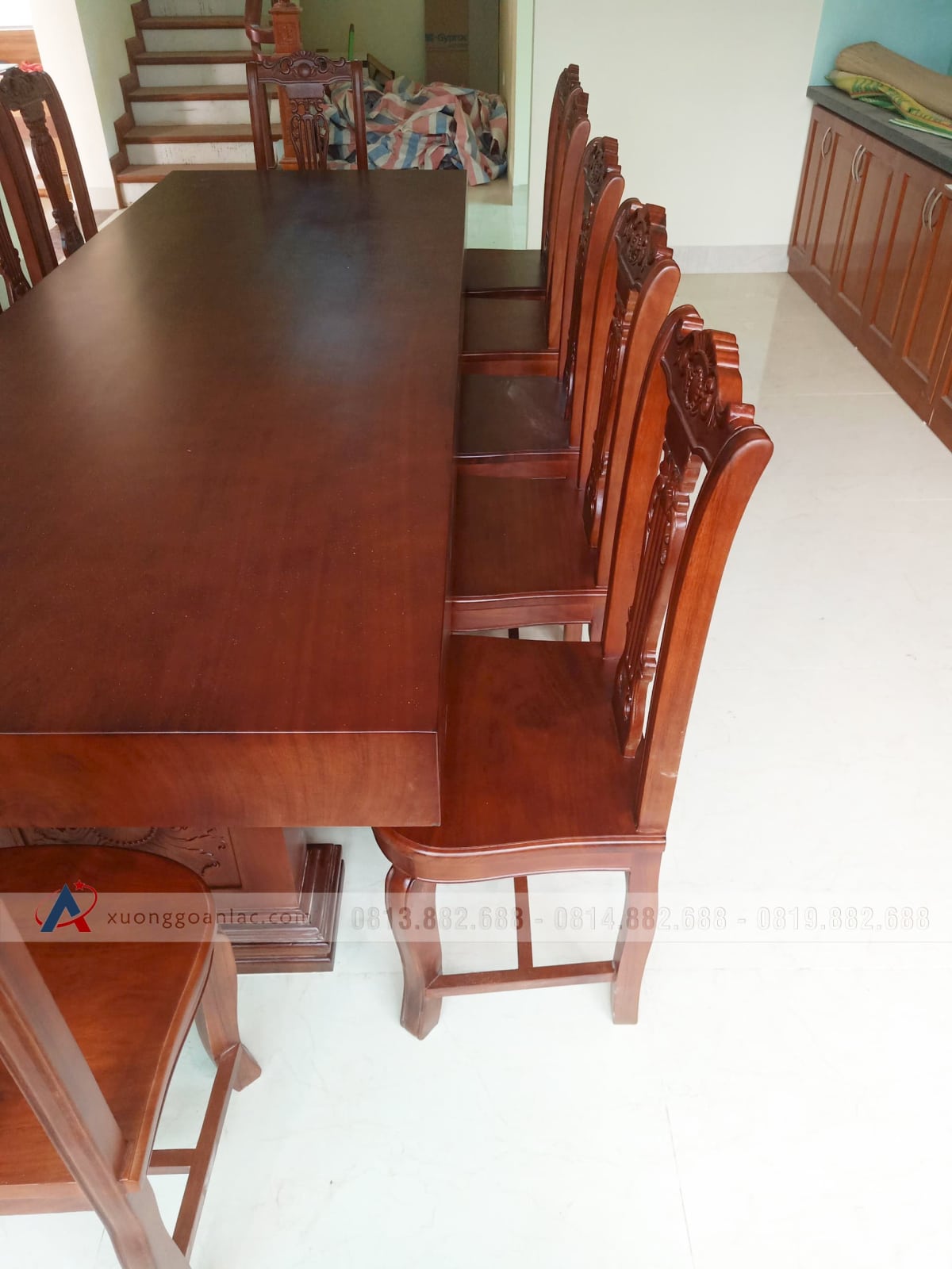 Bộ bàn ăn nguyên khối 12 ghế cây đàn gỗ gõ đỏ (Chú Danh, Hưng Yên) 7 Bộ bàn ăn nguyên khối 12 ghế cây đàn gỗ gõ đỏ (Chú Danh, Hưng Yên) - Ảnh 7