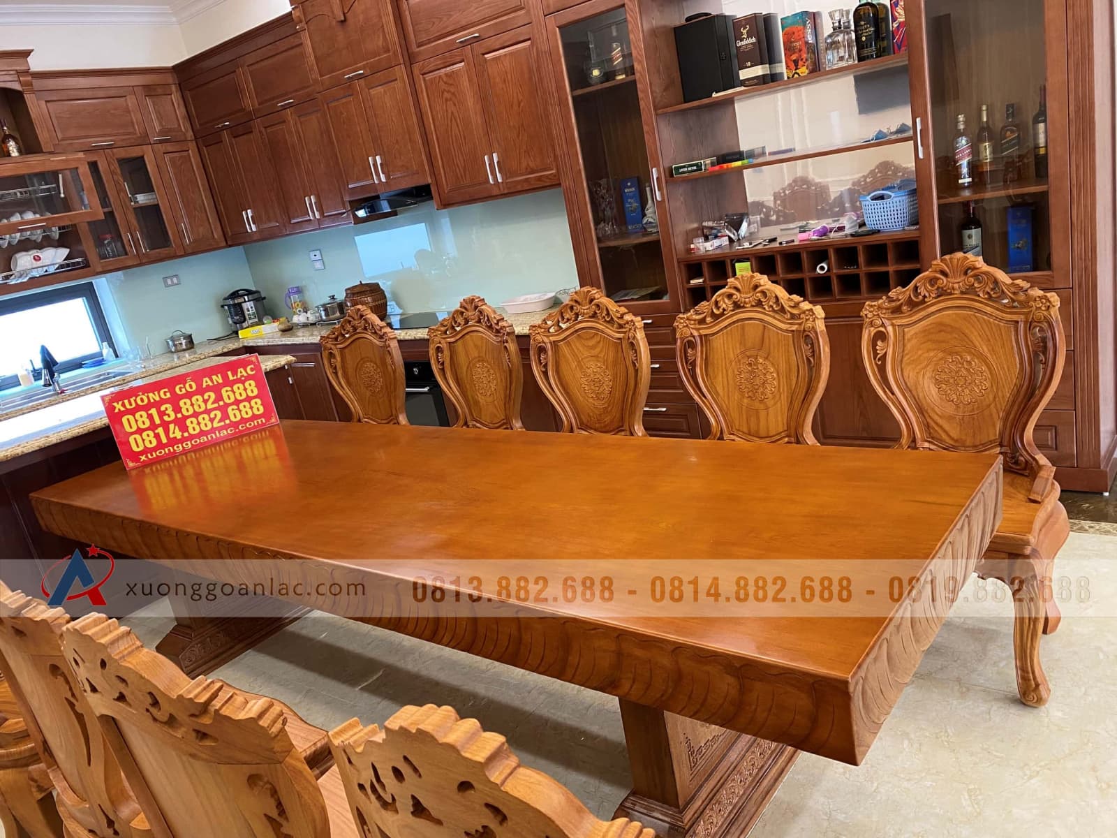 Bộ bàn ăn nguyên khối 10 ghế louis hoa lan tây có tay gỗ gõ đỏ (Anh Tiến,Thanh Hóa) 22 mẫu bàn ăn nguyên khối gỗ gõ đỏ cao cấp