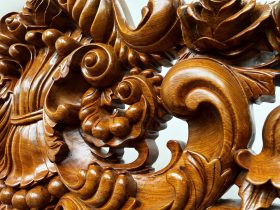 bàn ghế phòng khách đục hoa lá tây gỗ hương đá nguyên khối