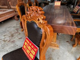Bộ bàn ăn gõ đỏ nguyên khối và 8 ghế louis bọc da (Anh Toàn, Bắc Giang) 12 ghế ăn đục hoa lá tây