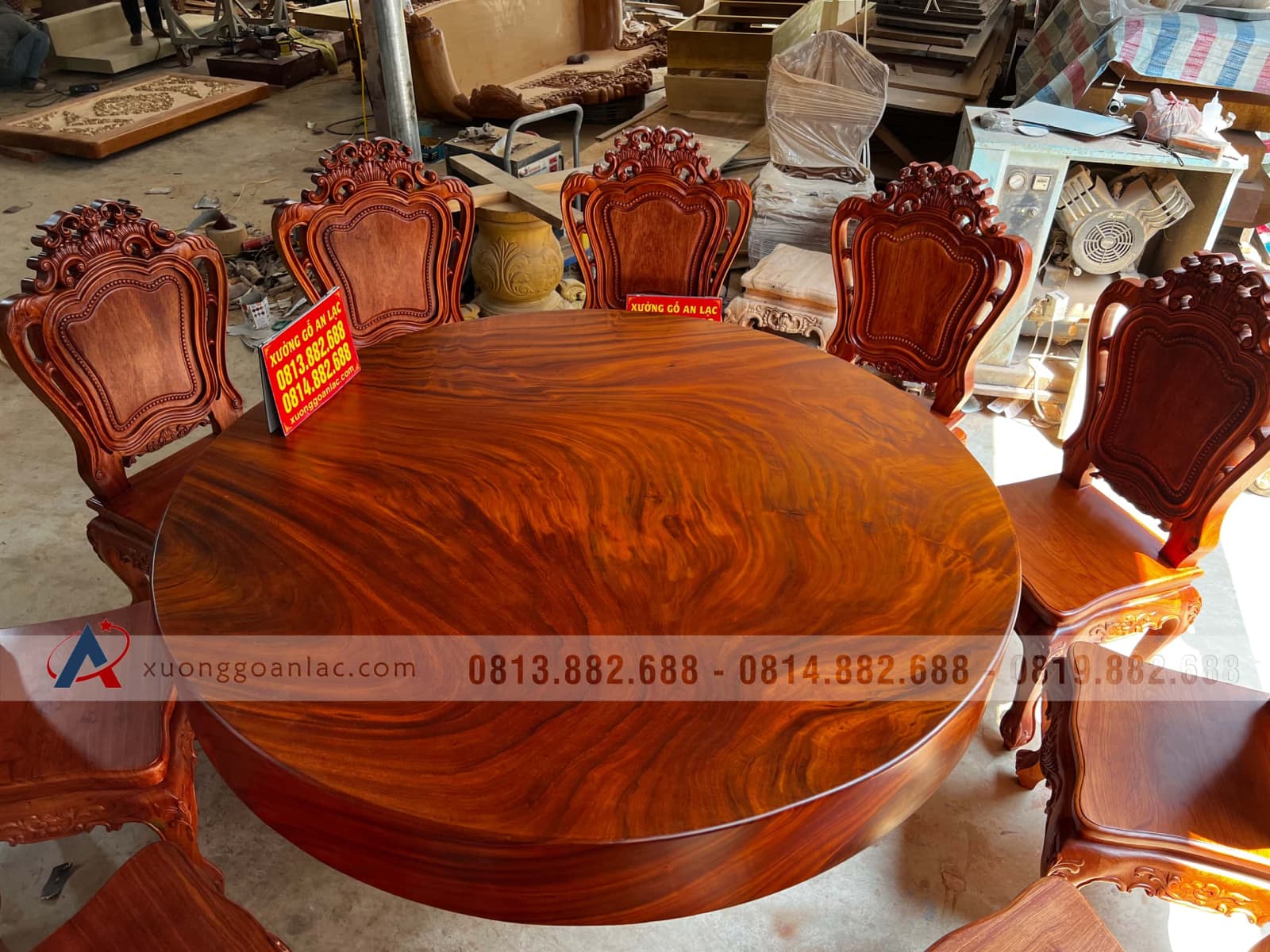 Bộ bàn tròn nguyên khối 160cm gỗ hương xám và 10 ghế Louis gỗ hương đá (Anh Chuẩn, Hải Phòng) 35 bàn ăn tròn gỗ hương xám vân uốn lượn đỉnh cao