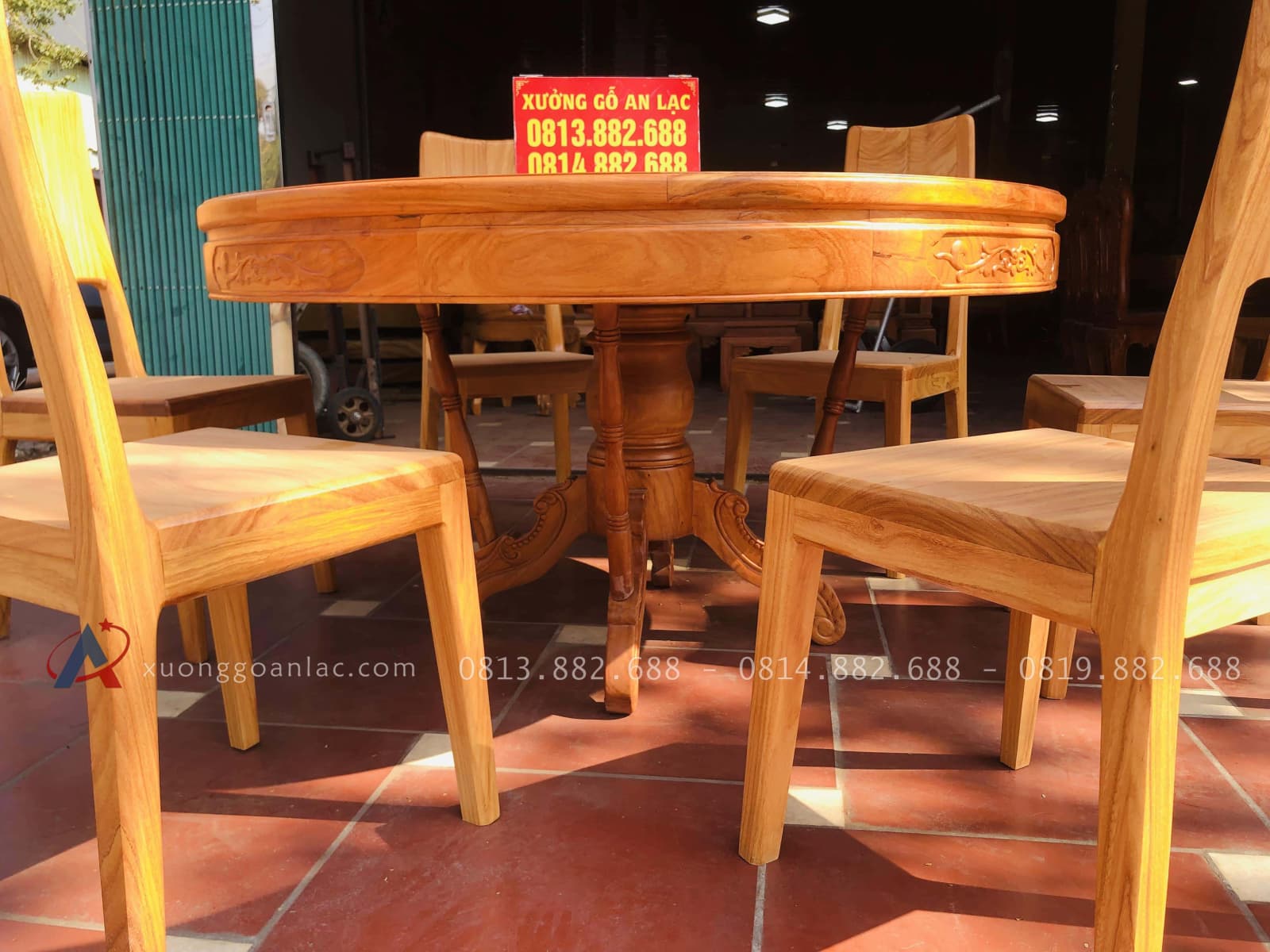 Bộ bàn ăn tròn 6 ghế hiện đại tựa trơn gỗ gõ đỏ (Anh Hải, Hà Nội) 4 Bàn ăn tròn gỗ gõ đỏ cao cấp