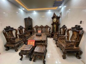 bàn ghế phòng khách gỗ mun hoa và đồng gồ cây tủ rượu