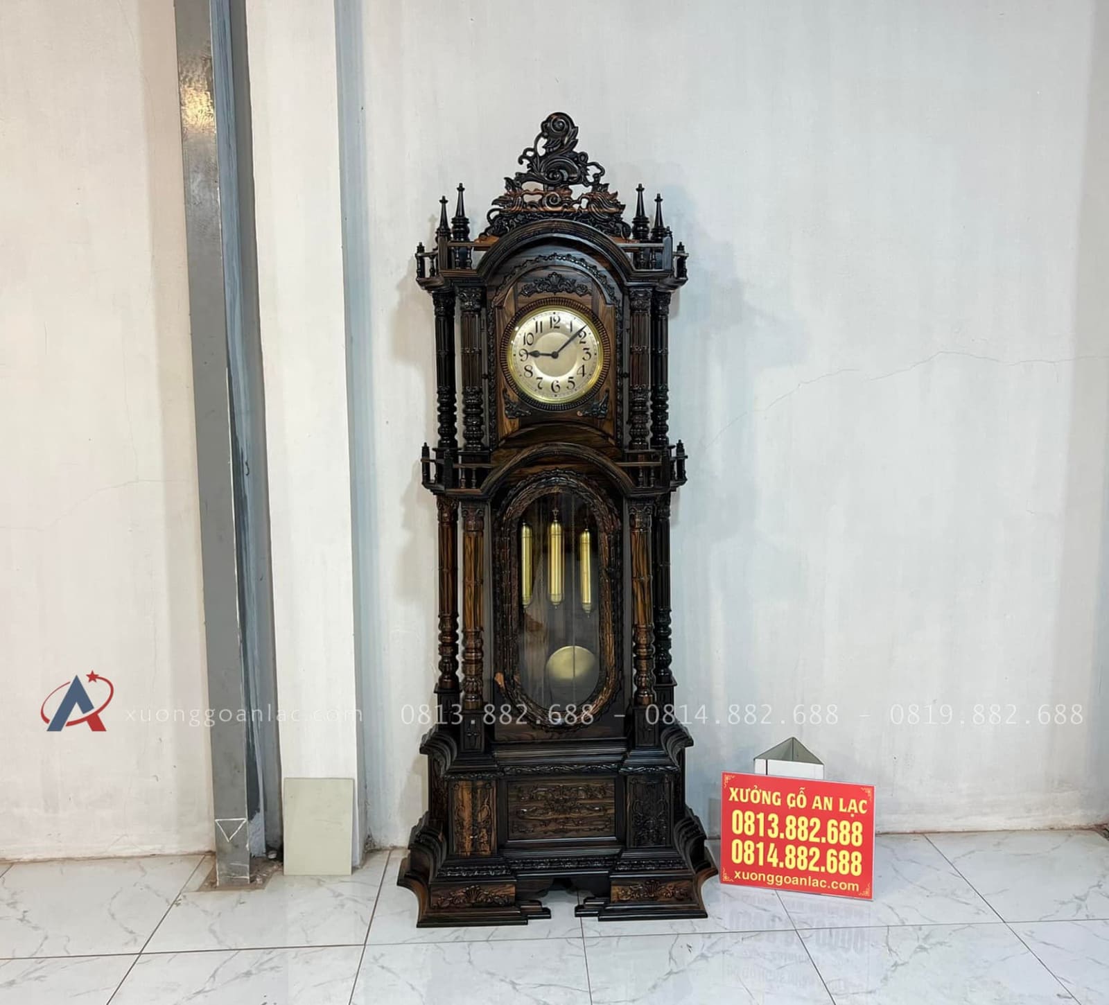 Mẫu Đồng Hồ Cây Tứ Trụ Vát Cao 2m3 Gỗ Mun Hoa Lào Cao Cấp (Anh Năm, Bắc Ninh) 6 mẫu đồng hồ cây tứ trụ cao 2m3 gỗ mun hoa