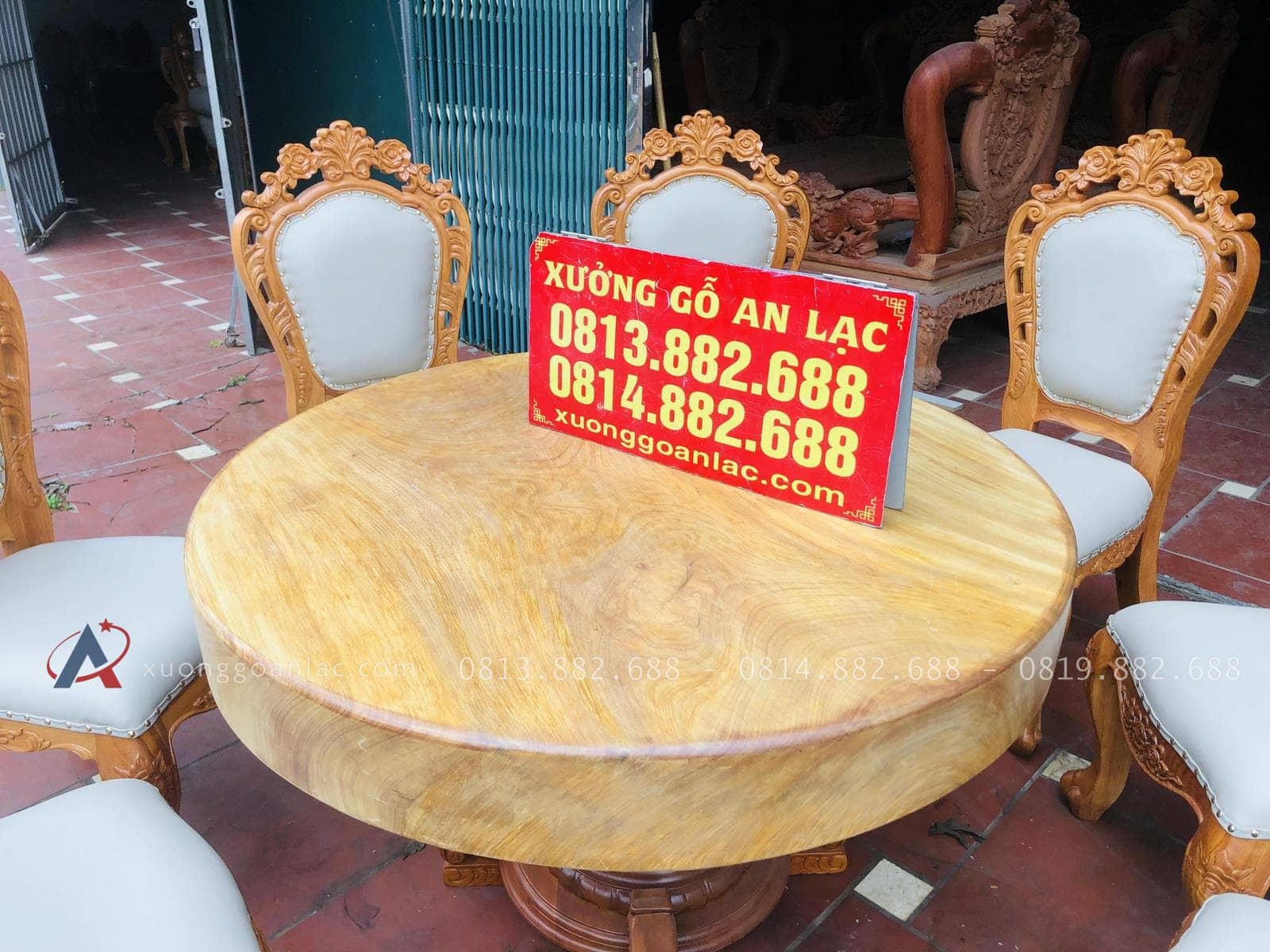 Bộ bàn ăn tròn nguyên khối 8 ghế louis hoàng gia bọc đệm cao cấp (Chú Lộc, Phú Thọ) 20 bàn tròn nguyên khối gỗ gõ đỏ
