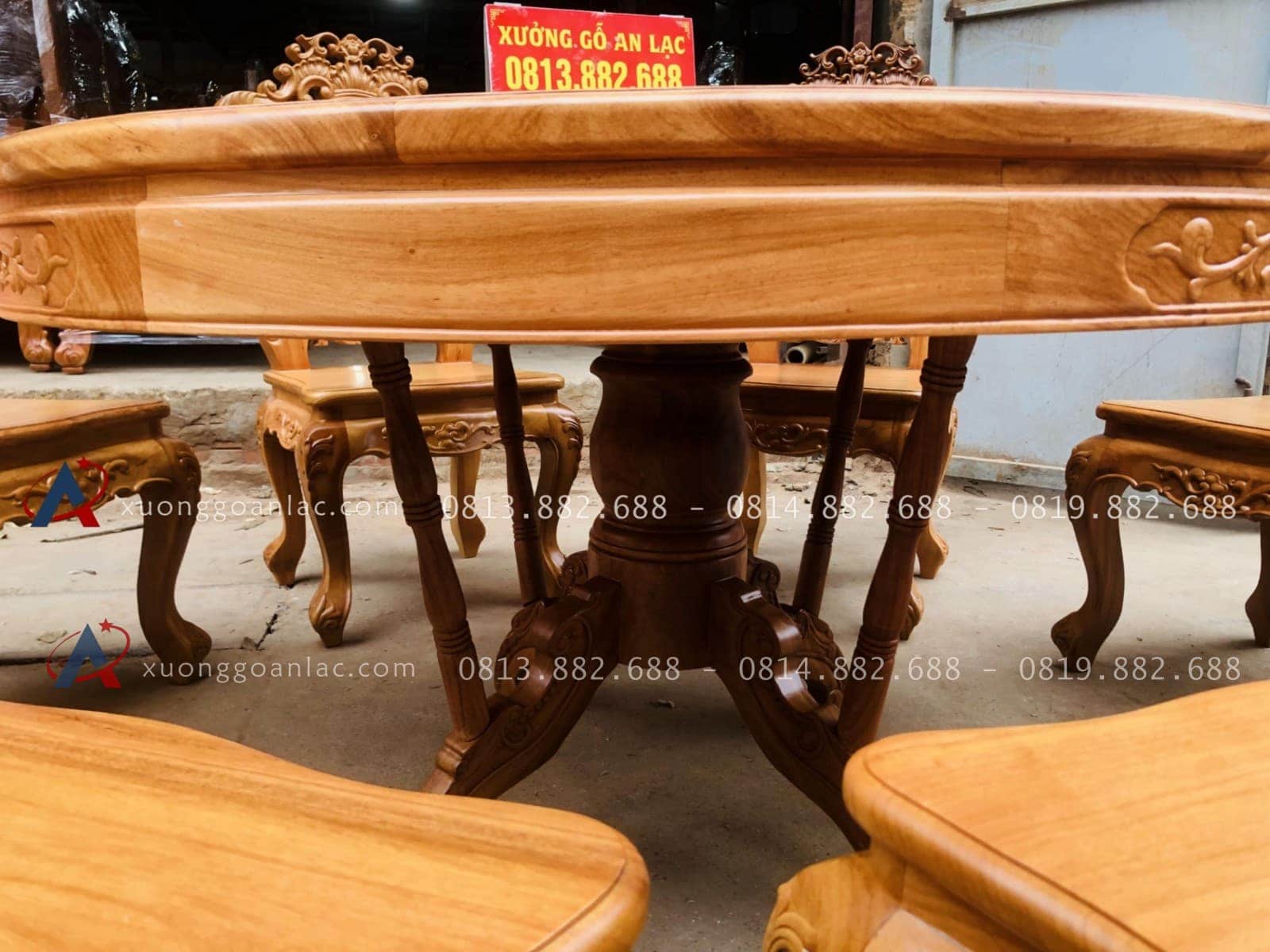 Bộ bàn ăn tròn xoay 1m37 và 8 ghế louis hoa lá tây gỗ gõ đỏ (Anh Tiến, Hà Nam) 23 hệ chân bàn ăn gỗ gõ đỏ độc đáo