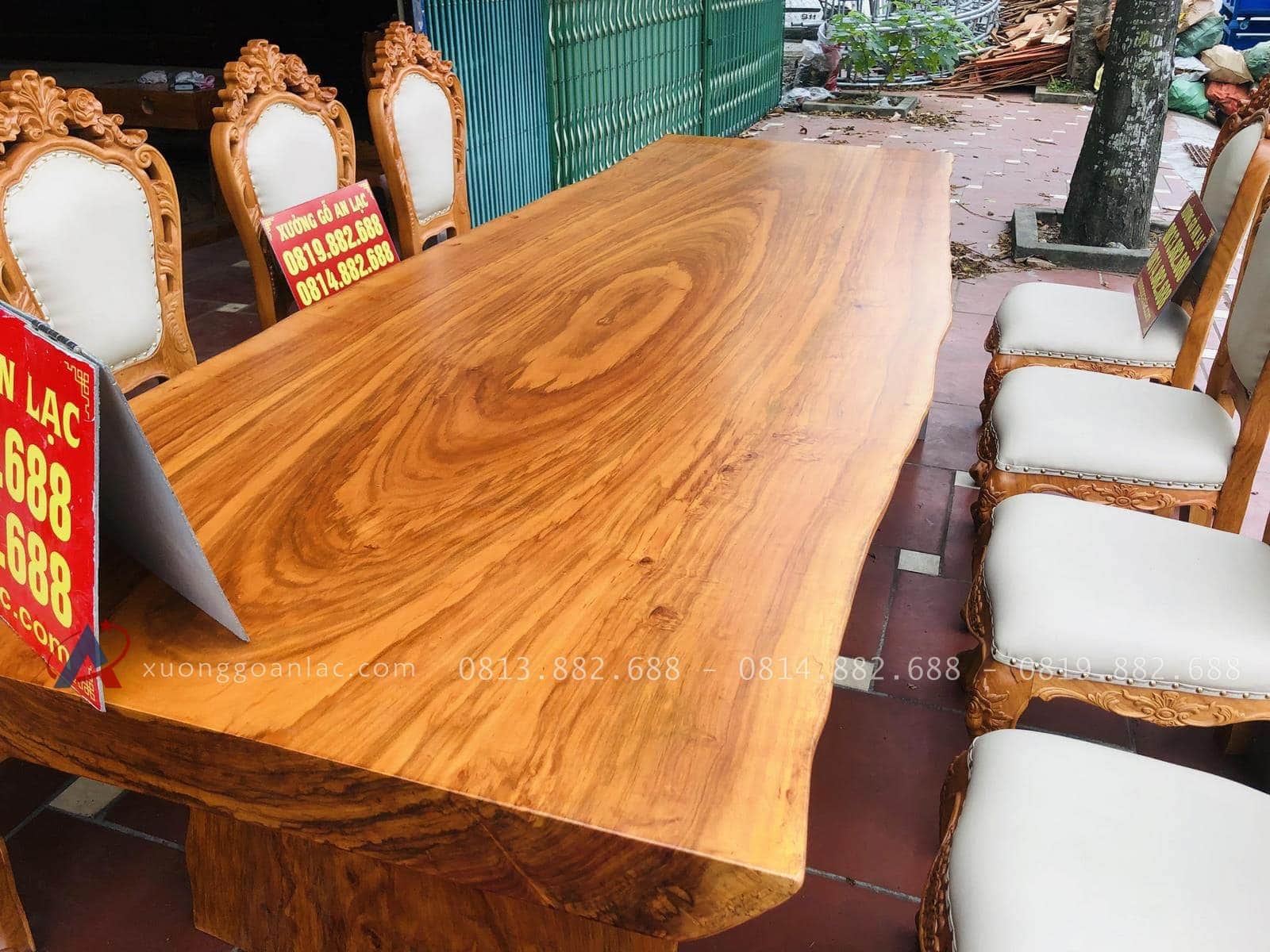 Bộ bàn ghế ăn nguyên khối gỗ cẩm chỉ 8 ghế louis bọc đệm gỗ gõ đỏ (Chú Nguyên, Thái Bình) 26 bàn ăn nguyên khối gỗ cẩm