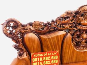 Bộ bàn ghế hoàng gia 6 món gỗ gõ đỏ cao cấp (Anh Tâm, Hòa Bình) 34 vai ghế ôm cong tạo hình hoa lá tây