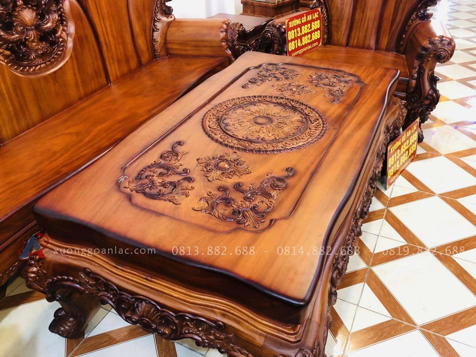 Bộ bàn ghế hoàng gia 6 món gỗ gõ đỏ cao cấp (Anh Tâm, Hòa Bình) 46 bàn trà nguyên khối mặt đục hoa lá tây