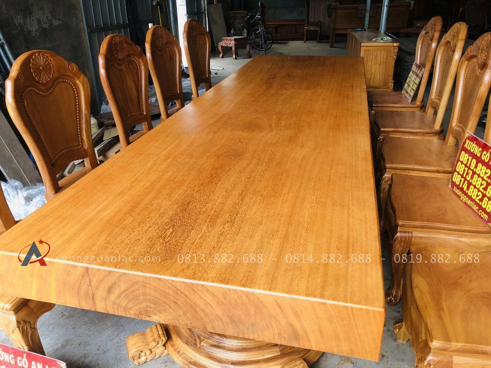 Bộ bàn ăn chân tròn nguyên khối 10 ghế hoa cúc gỗ gõ đỏ hàng vip (Anh Đại, Bắc Giang) 24 bàn ăn nguyên khối gõ gõ đỏ chân tròn