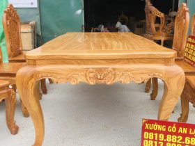 Bộ bàn ghế ăn hoàng gia 6 ghế hồng hạt gỗ gõ đỏ (Chú Lân, Cao Bằng) 13 Yếm quây tạo hình uốn lượn chạm hoa hồng lá tây