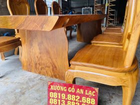 Bộ bàn ăn nguyên khối 8 ghế hoa cúc gỗ gõ đỏ hàng vip (Chú Thế, Bình Phước) 18 chân bàn nguyên khối