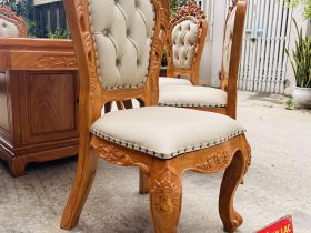 Bộ bàn tròn xoay 10 ghế louis bọc đệm gỗ gõ đỏ (Anh Bắc, Hà Nội) 22 Các họa tiết hoa lá tây đục kênh bong tinh xảo trên khung ghế