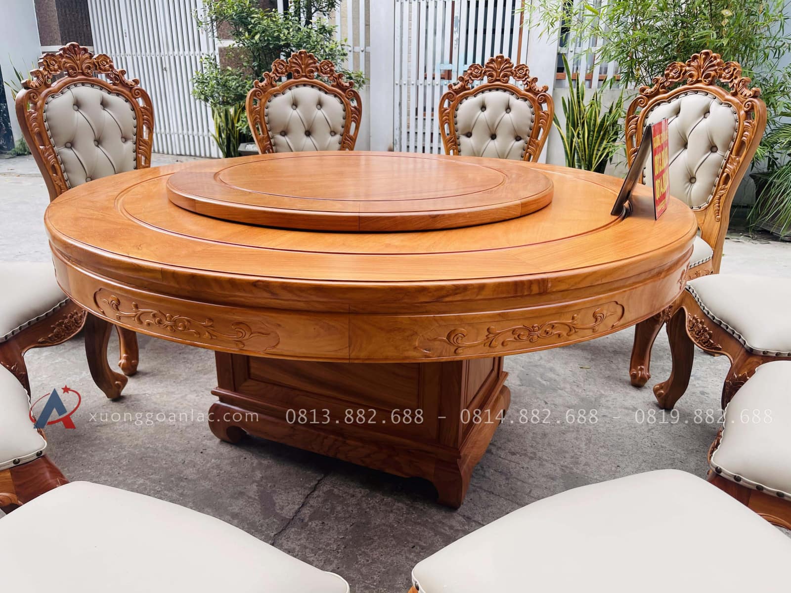 Bộ bàn tròn xoay 10 ghế louis bọc đệm gỗ gõ đỏ (Anh Bắc, Hà Nội) 31 yếm bàn chạm lá tây