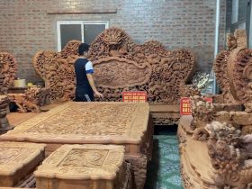 bàn ghế cửu long bát mã gỗ hương đá cao cấp